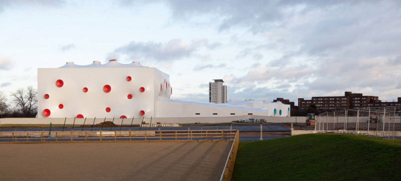 Illustration for article titled Technicolor Bullet Holes Make This the Perfect Home for Olympic Shooting